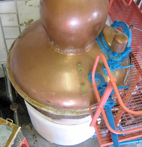 Looking down at a distillation pot